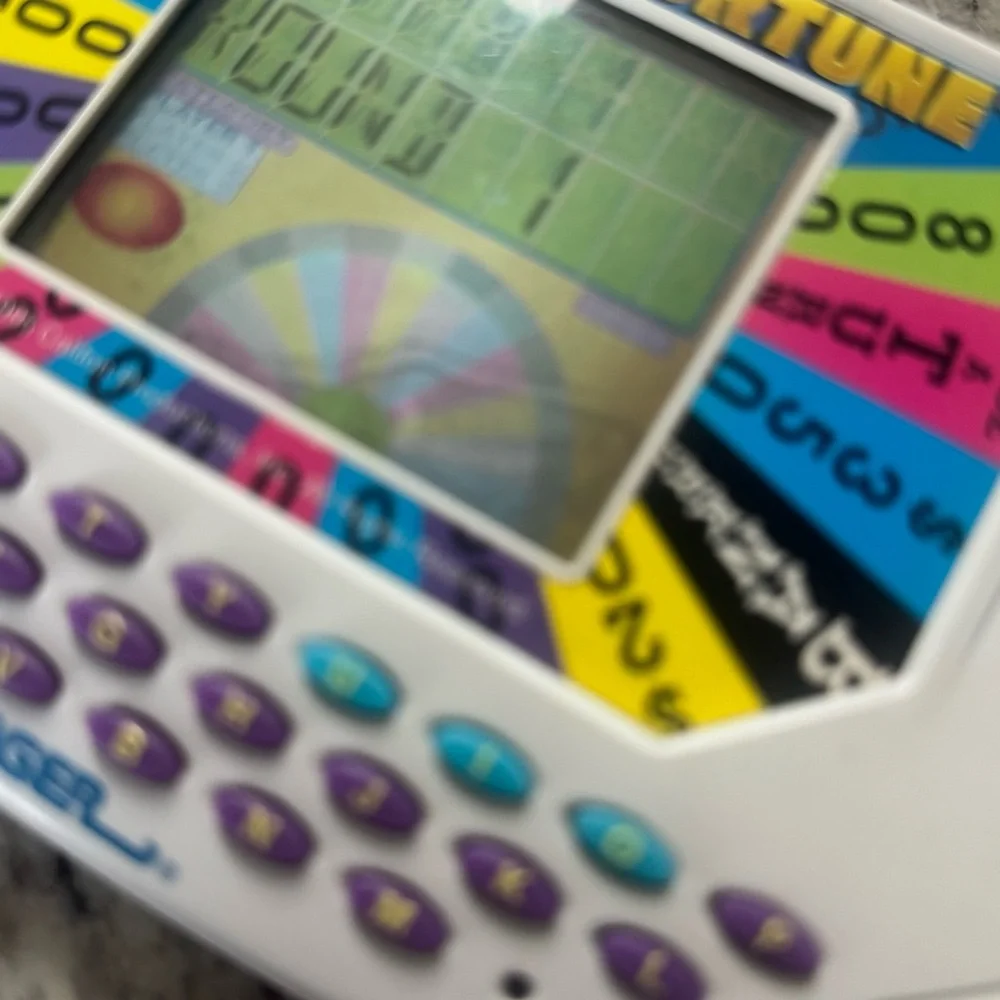Tiger Wheel of Fortune Handheld Game 1995 – Tested & Working with Sound‎